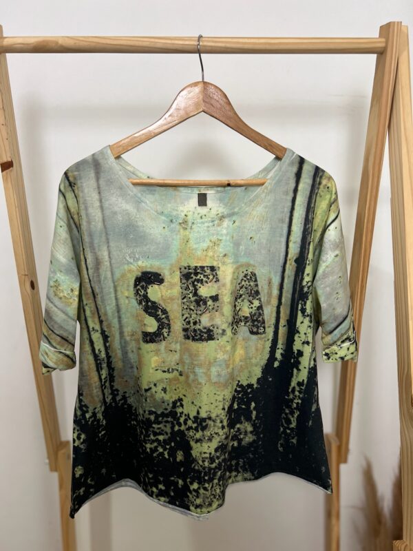 Blusa de manga curta soltinha